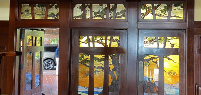 Torrey Pines Lodge Entrance Featuring Torrey Pines Tree in Stained Glass