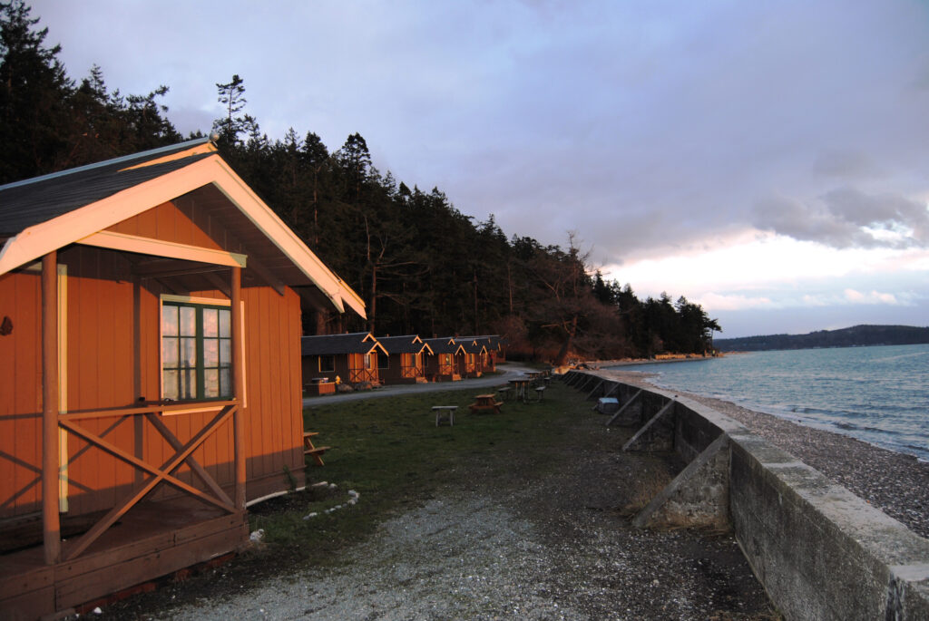 Cama Beach Cabins on Water Frontage by Sherrye Wyatt