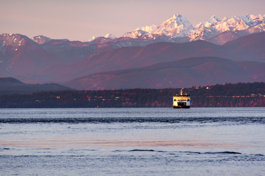 Washington Ferry Headed to the Islands with Mountains in the Background