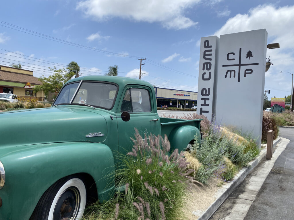 Green Pick Up and The Camp Sign