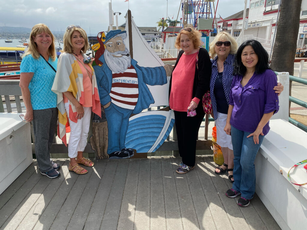 Duffy Boat Ceramic Captain with 5 Women Around Him Waiting to Board