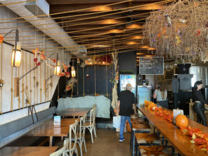 Bivouac Ciderworks Interior with Table on Swing Rope at Rear