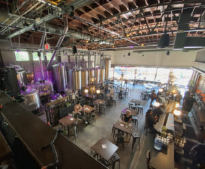 North Park Beer Co. taken from above loft showing brewing area and seating