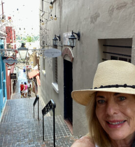 Selfie with narrow alley of shops in Hamilton