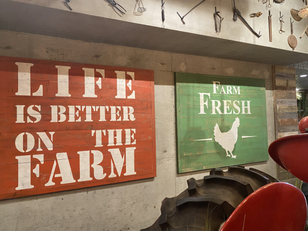 Life Is Better on the Farm sign with Farmall Tractor