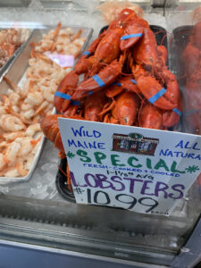 Harbor Fish Market display of lobster for $10.99 each