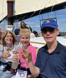 Aboard a sailboat with Meg and Tom on a Maine Sailing Adventures trip for a wine sail