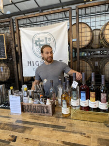 Matt Glenn at Highside Distilling pouring a cocktail made with their spirits