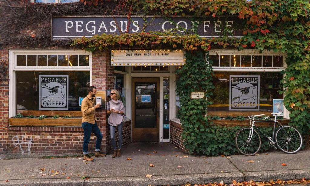 Beautiful brick building with brightly colored fall ivy on Pegasus Coffee on Bainbridge Island