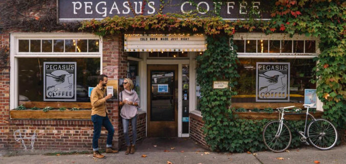 Beautiful brick building with brightly colored fall ivy on Pegasus Coffee on Bainbridge Island