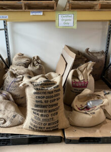 Bags of coffee waiting to be roasted