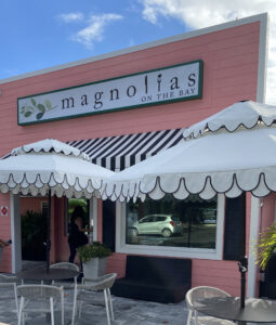 Exterior of the Pink and Umbrella Entrance to Magnolia's On The Bay