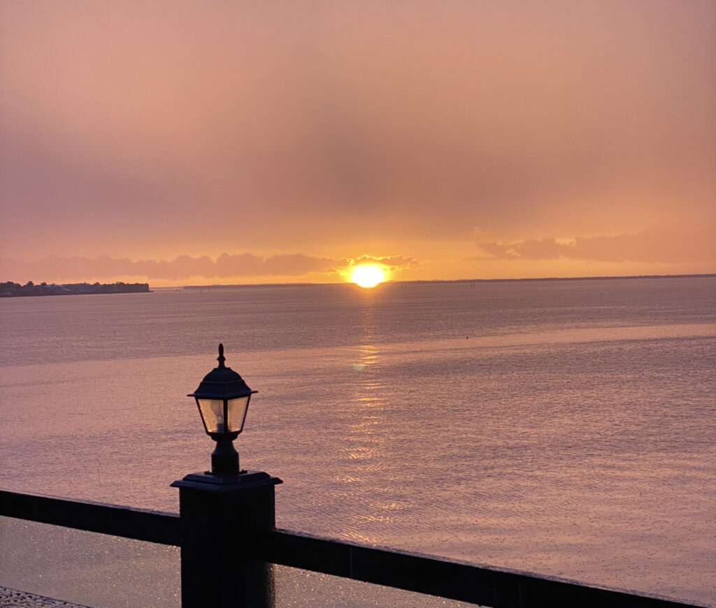 Punta Gorda Pink Sunset with Railing in Foreground