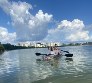 Lorena Lopez and me in a glass bottom kayak on Shell Island Preserve with Get Up & Go Kayaking