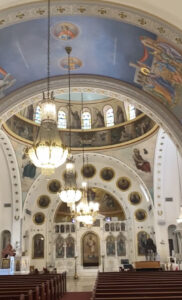 Interior of Byzantine art with gold and silver leaf and frescoes on the ceiling at Saint Nicholas Cathedral