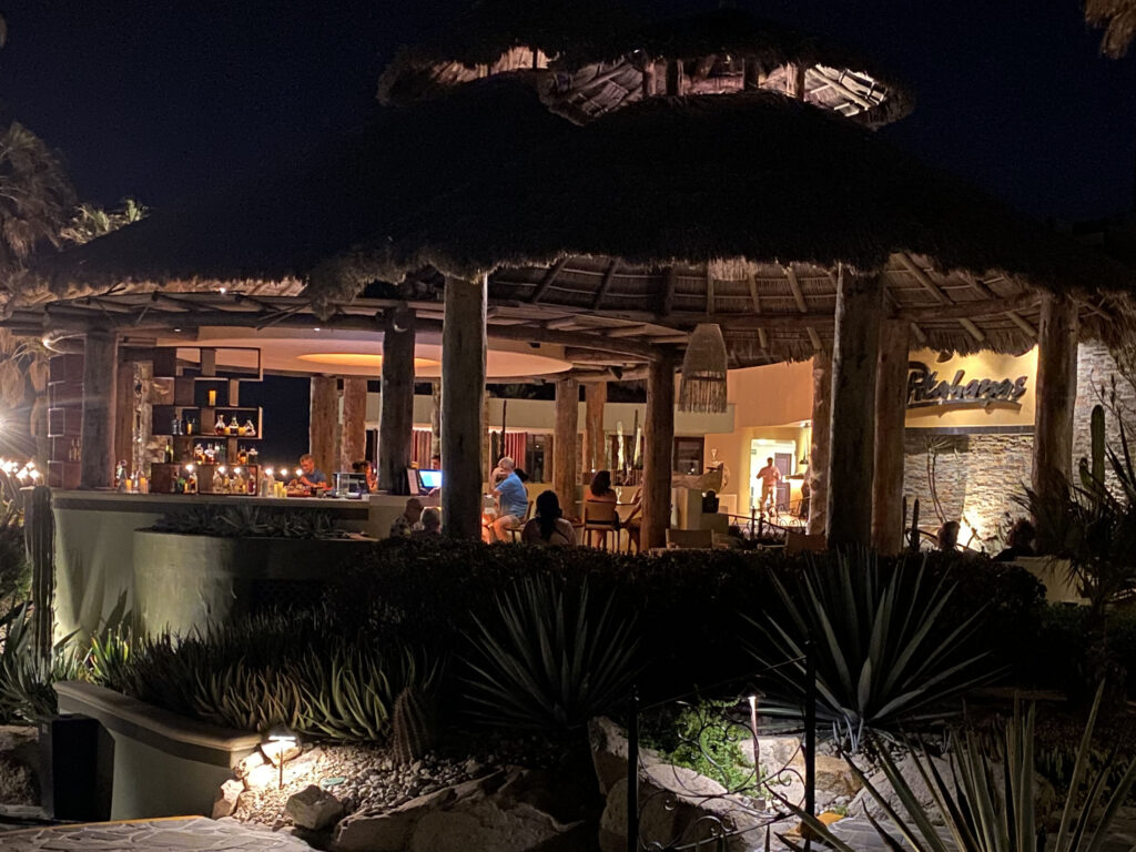 Pitahayas Restaurant in the evening with al fresco dining overlooking the sea