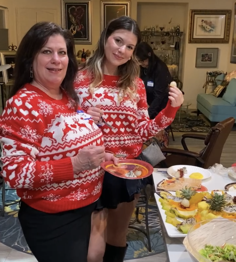 Mother and daughter choosing fruits at Friendsgiving