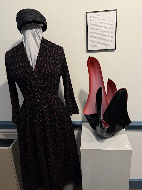 Heritage Village Display of Vintage Dress with Matching Glass Sculpture