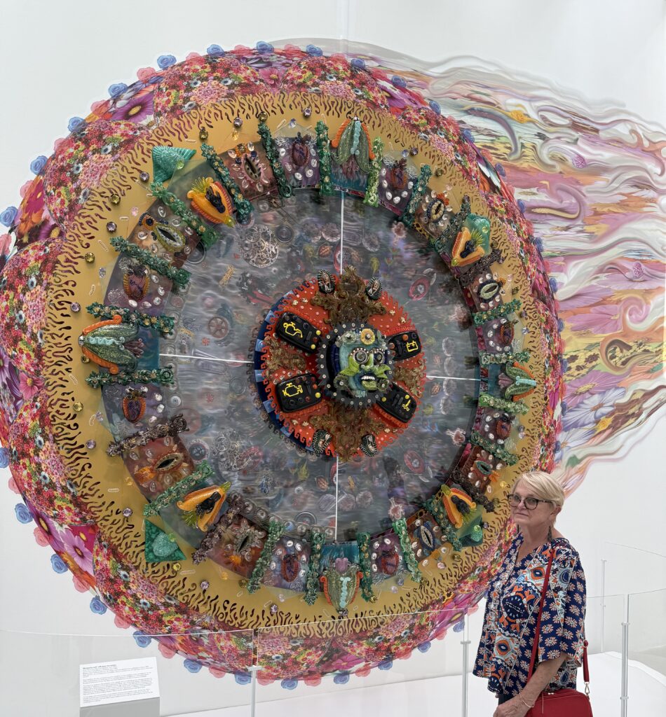 Museum of Glass colorful round wall sculpture with Sandi